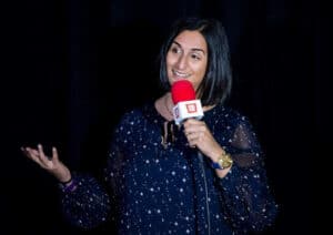 Shereen Kassam performing stand up comedy
